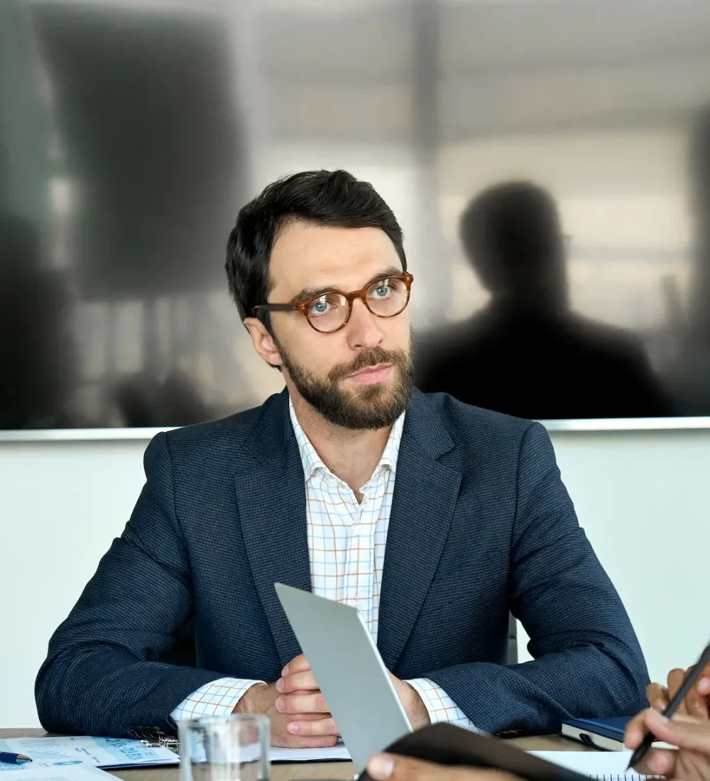 serious-male-ceo-discussing-company-strategy-at-bo-2025-02-11-16-23-50-utc